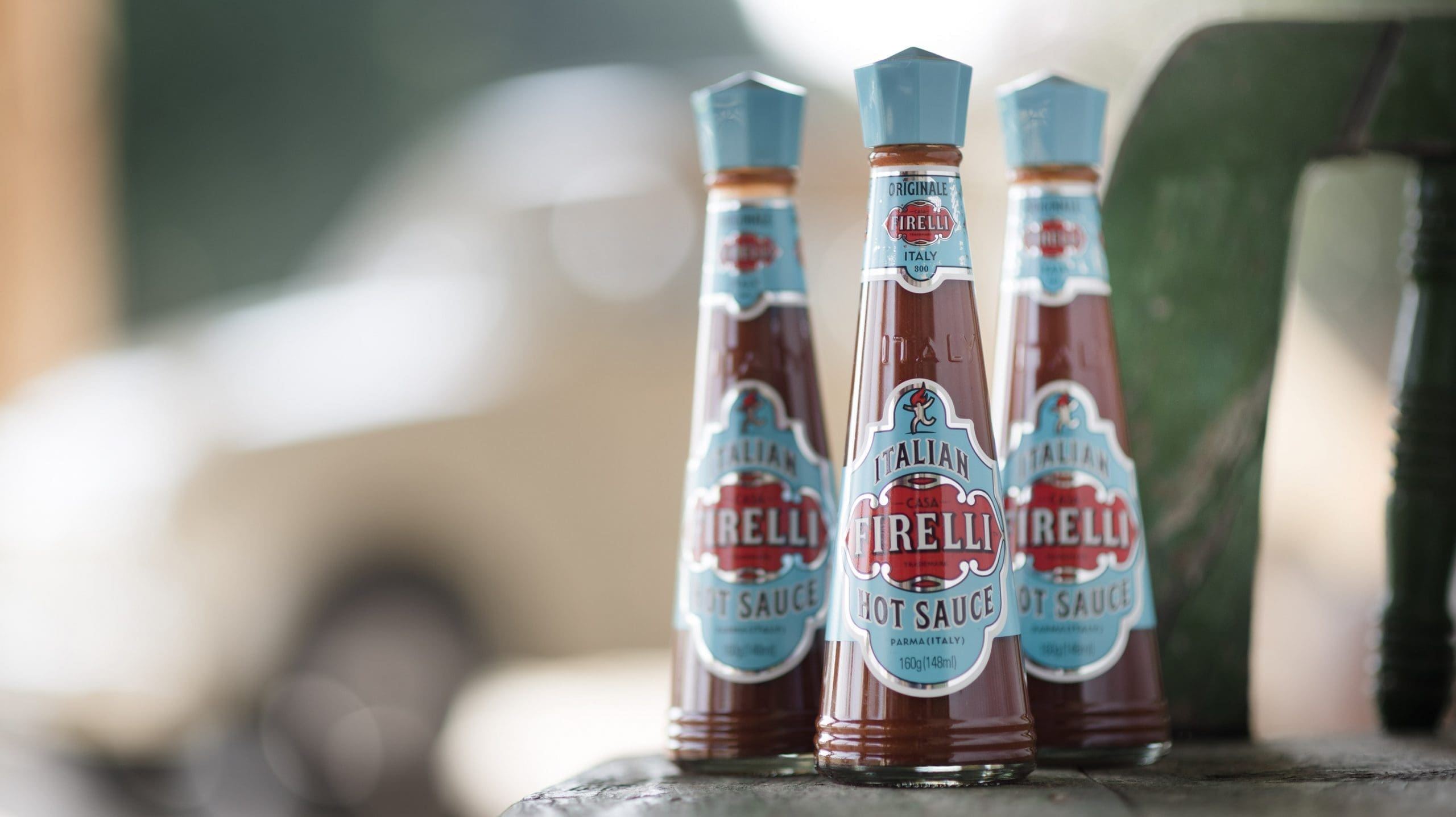 3 bottles of firelli hot sauce