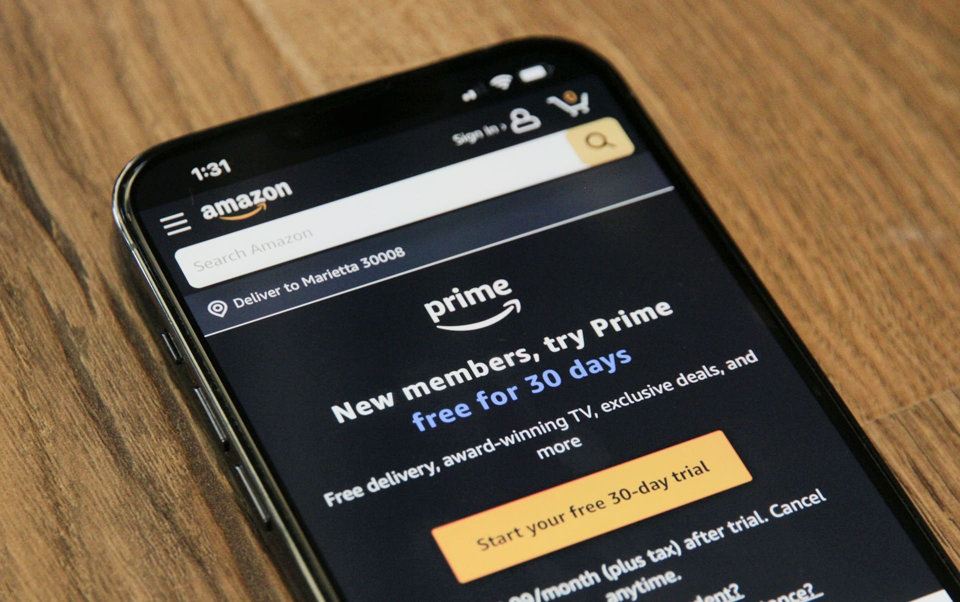 A mobile phone on the sign up screen for Prime