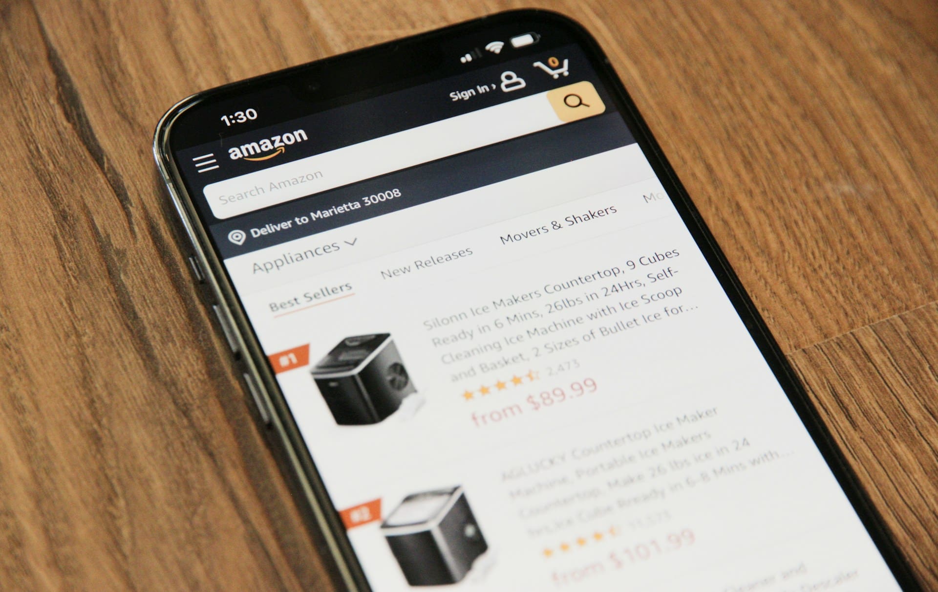 A phone with amazon listings pulled up under a search term