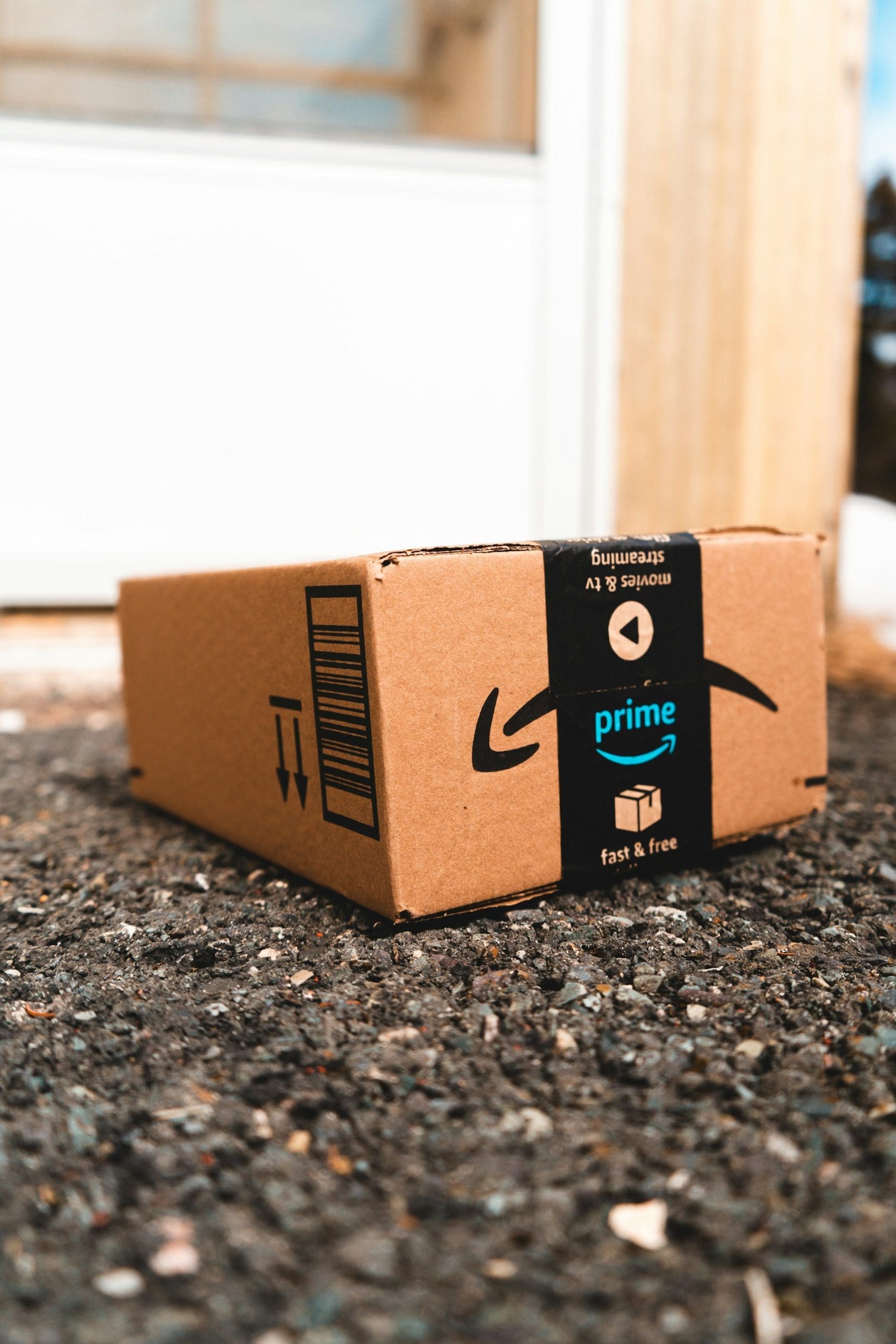 An Amazon package with the Prime badge on a doorstep